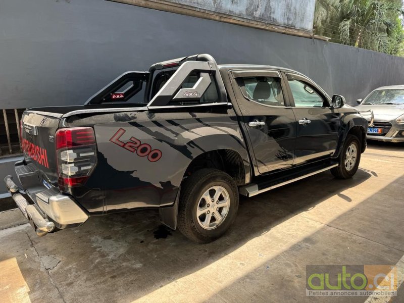 Photo 1 AUTO.CI : Mitsubishi L200 2.0L 