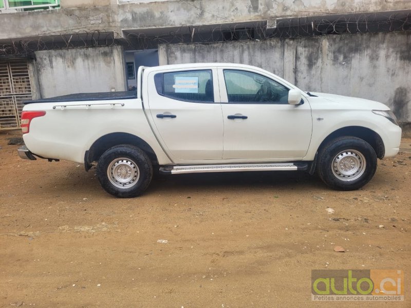 Photo 2 AUTO.CI : Mitsubishi L200 2.0l 