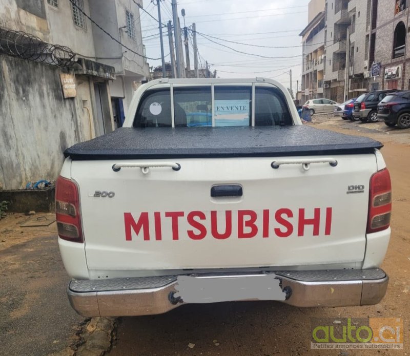 Photo 3 AUTO.CI : Mitsubishi L200 2.0l 