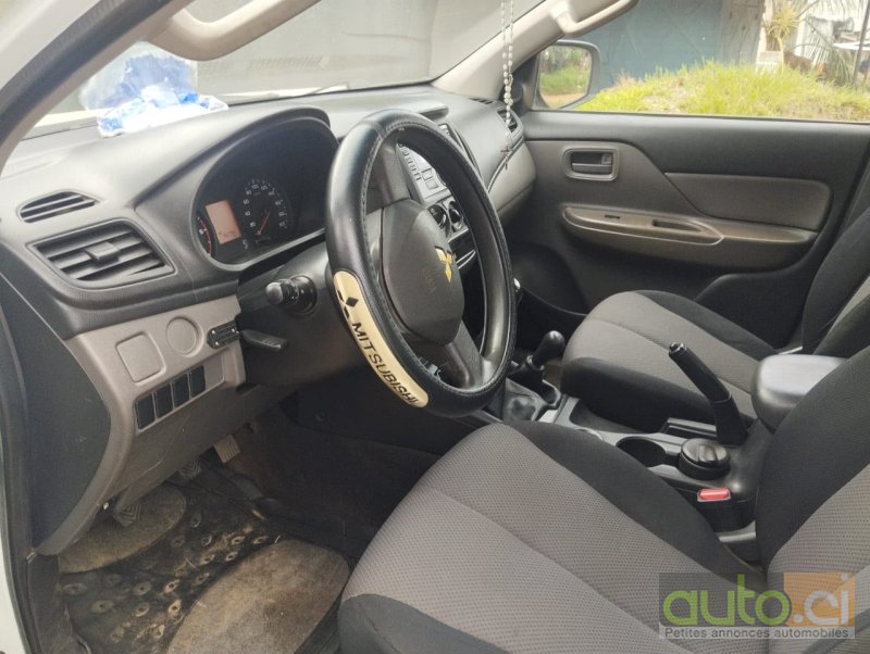 Photo 4 AUTO.CI : Mitsubishi L200 2.0l 